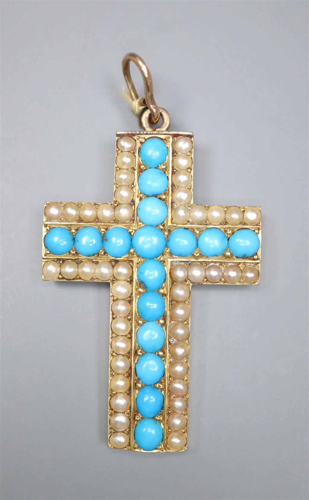 A late Victorian yellow metal, turquoise and seed pearl cluster set cross pendant, 36mm, gross 8.5 grams.